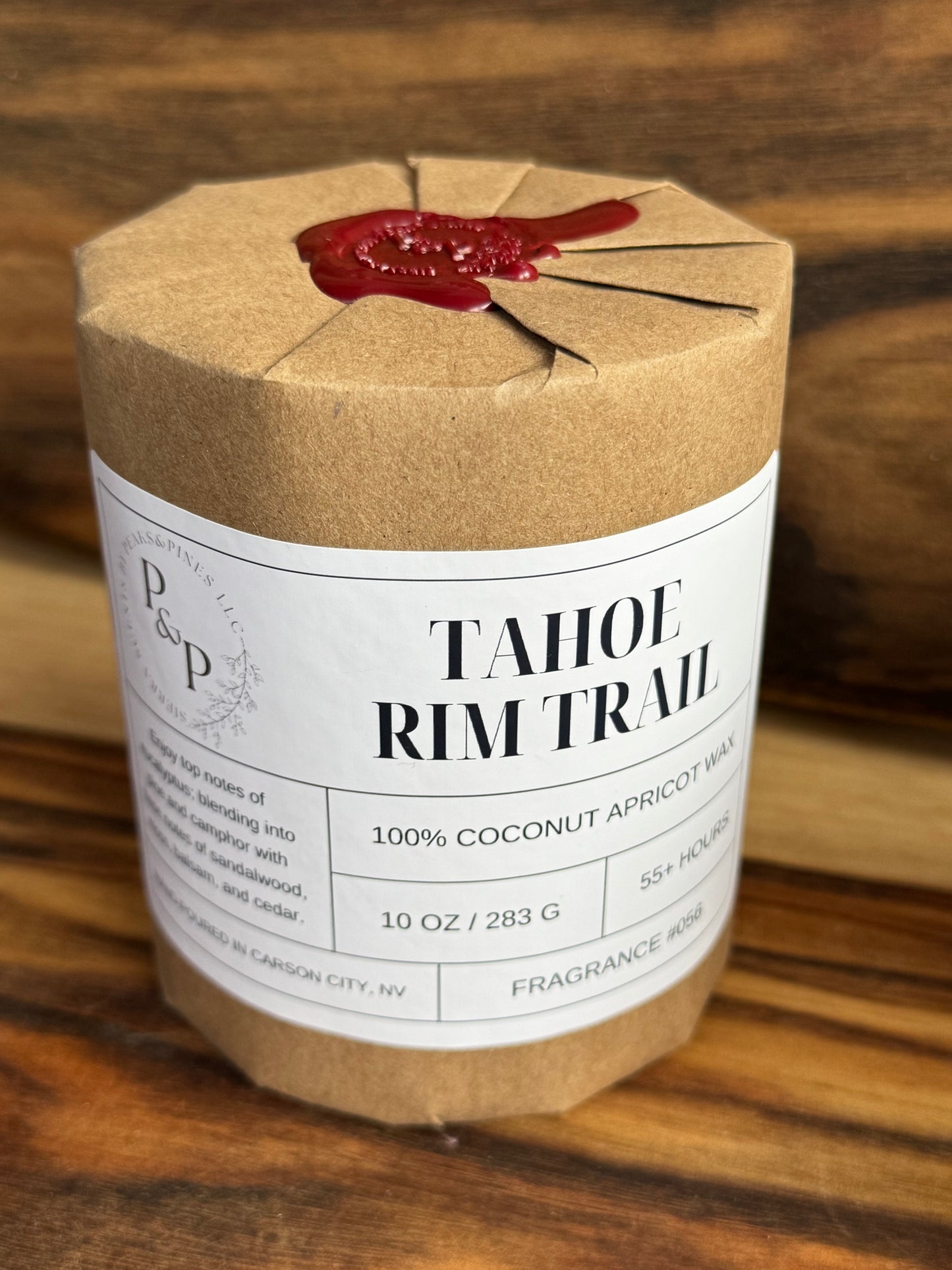 Wrapped Tahoe Rim Trail 10 oz candle with wax seal, gift-ready packaging by Peaks and Pines.