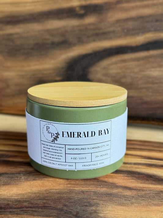 Emerald Bay 4 oz ceramic candle by Peaks and Pines, green ceramic jar with wood lid and white label