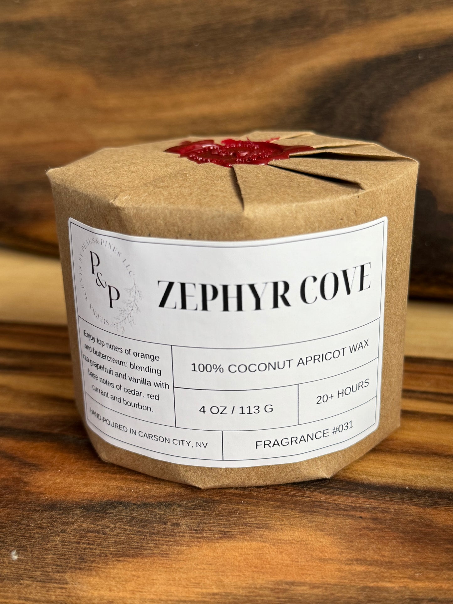 Wrapped Zephyr Cove 4 oz candle with wax seal, gift-ready packaging