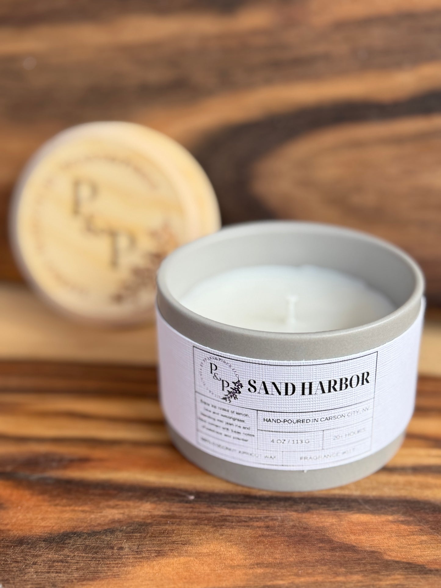 Sand Harbor 4 oz candle close-up showing wood lid 