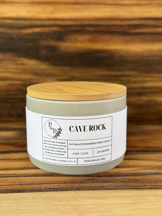 Cave Rock 4 oz ceramic candle by Peaks and Pines, grey ceramic jar with wood lid and white label