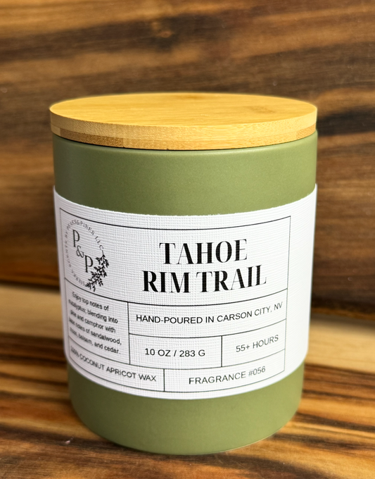 Tahoe Rim Trail 10 oz ceramic candle by Peaks and Pines, green ceramic jar with wood lid and white label